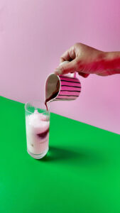 Slowly pour Beet Juice into milk. Photo by Charles Malene for MoodyEater™