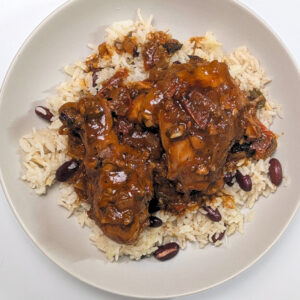 Brown Stewed Chicken on Rice and Peas. Photo by Charles Malene for MoodyEater™