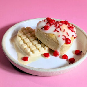Mini Coconut Heart Cakes topped with candied hearts and sprinkles. Photo by Charles Malene for MoodyEater™