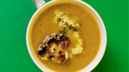 Révolution Réchauffé 02: Close-up shot of Apple Pumpkin Soup with Roasted Cauliflower and Sunflower Miso Tahini Dressing. Photo by Charles Malene for MoodyEater™