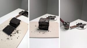 Jet Black Velvet Cake cut into layers and first creme coat of black icing applied. Photo by Charles Malene for MoodyEater™