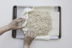 Folding edges of galette. Photo by Charles Malene for MoodyEater™