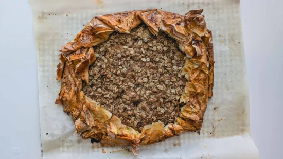 Apple Crumble on parchment paper. Photo by Charles Malene for MoodyEater™