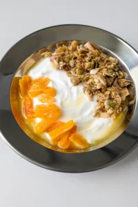 Café Cecilia Granola with DIY yogurt and poached apricots. Photo by Charles Malene for MoodyEater™