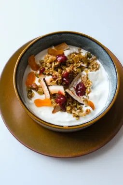 Close-up of Café Cecilia Granola with DIY yogurt, berry jam and poached apricots. Photo by Charles Malene for MoodyEater™