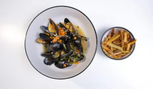 Moules Frites (mussels and fries). Photo by Charles Malene for MoodyEater™