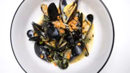 Hero shot of Champagne Moules (Mussels). Photo by Charles Malene for MoodyEater™